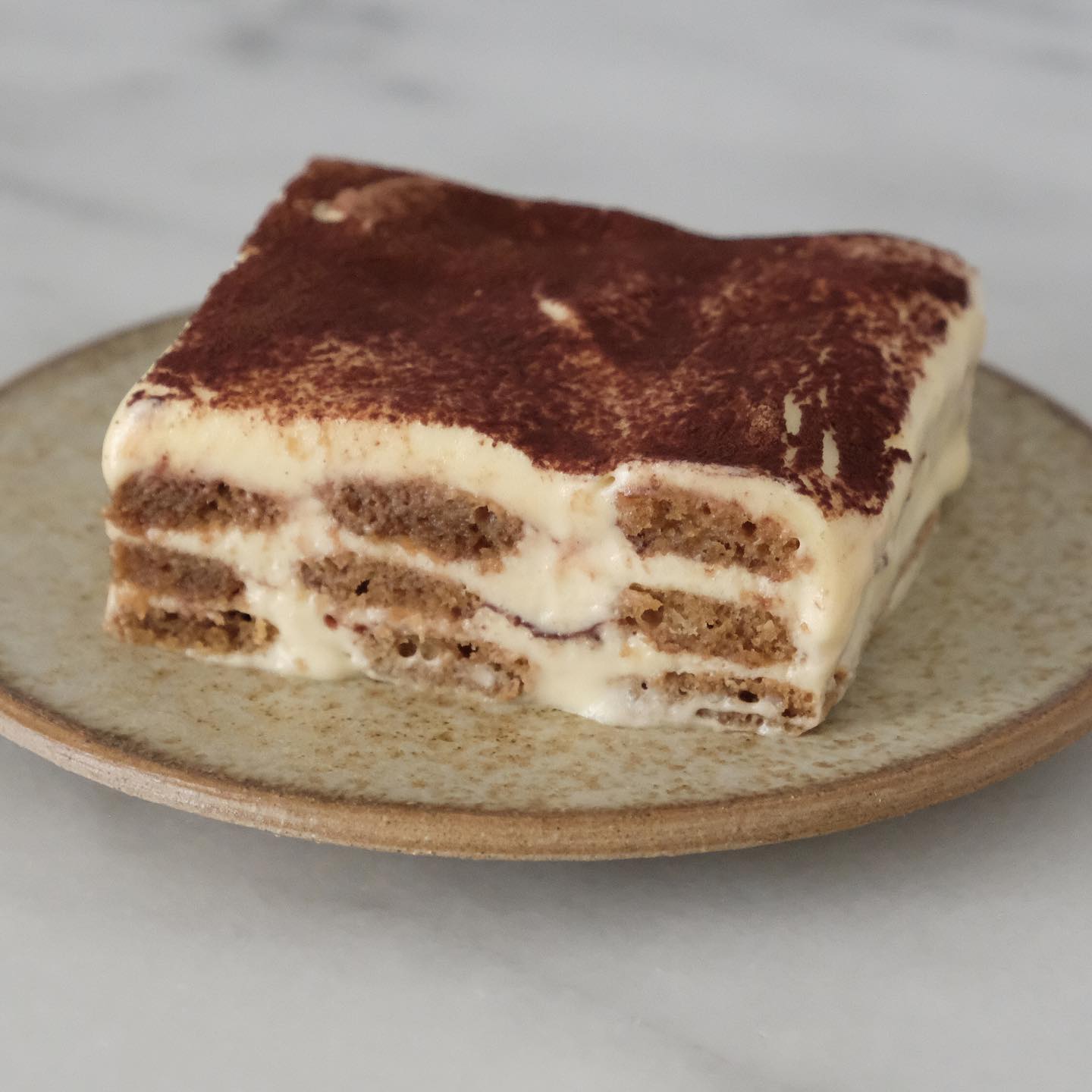 Tiramisusi. Aqui pode comer um tiramisù que sabe a nuvem com camadas de sonho (e feito por uma família italiana)