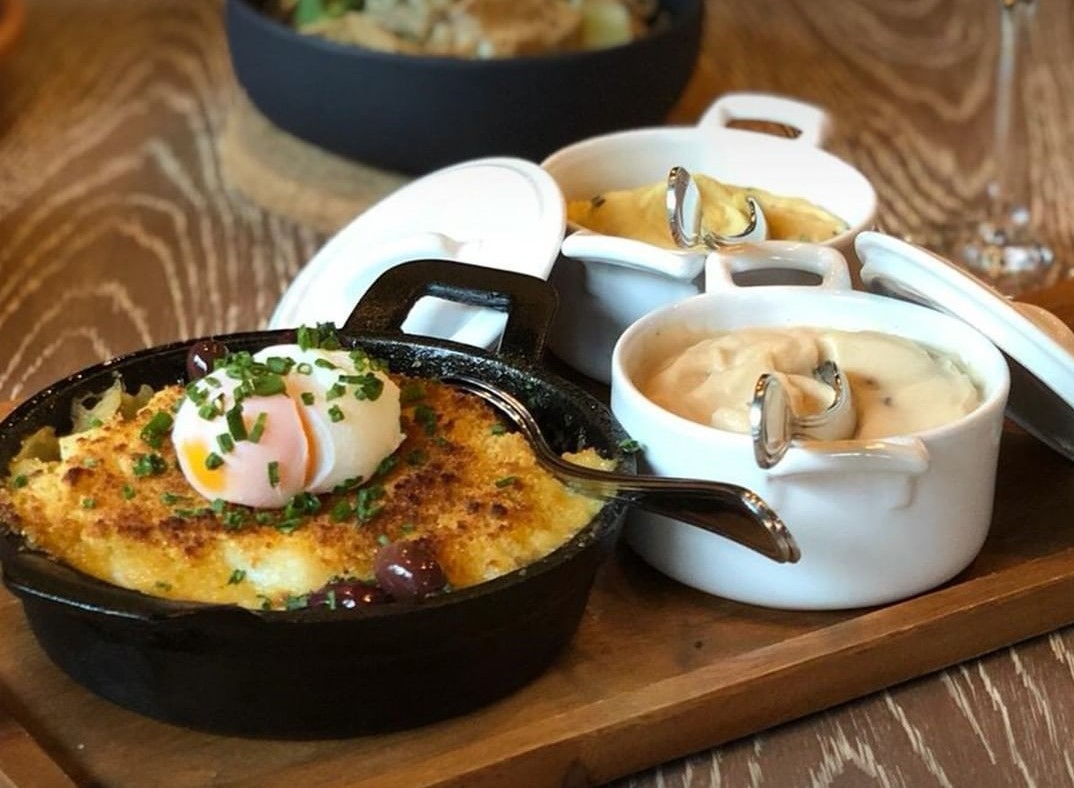 Um restaurante para comer em casa. A comida para partilhar do SoMos, no Porto
