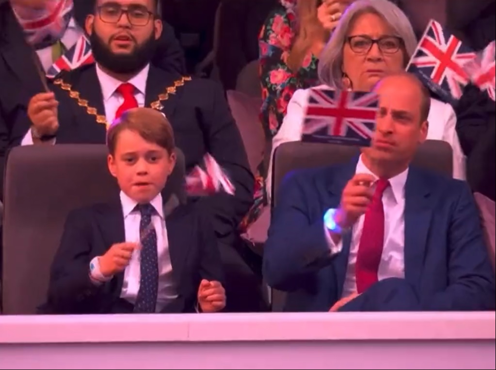 Esta imagem de William, George (e a misteriosa senhora carrancuda) resume o concerto de homenagem à rainha Isabel II