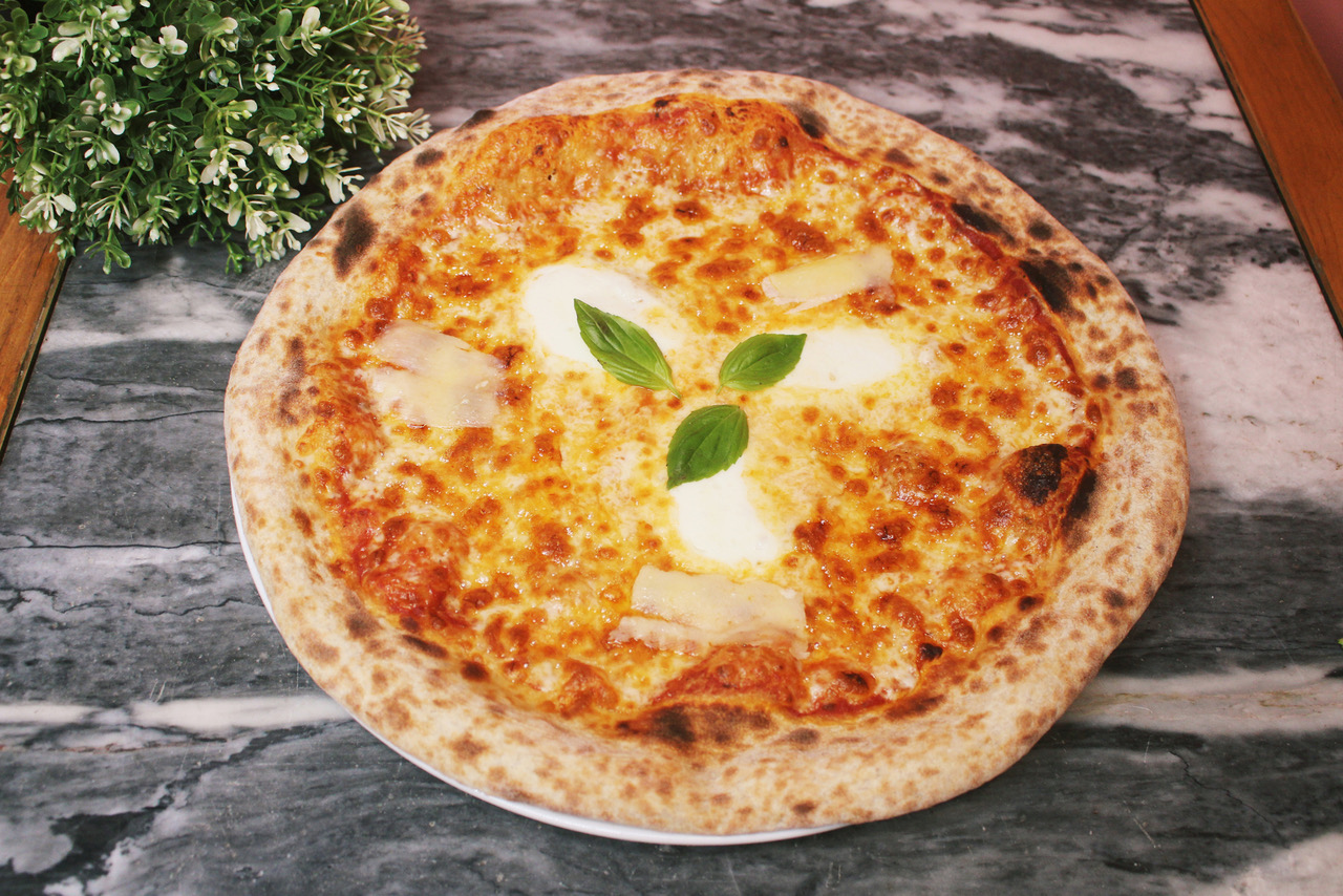 Um restaurante para comer em casa. As famosas pizzas da Luzzo