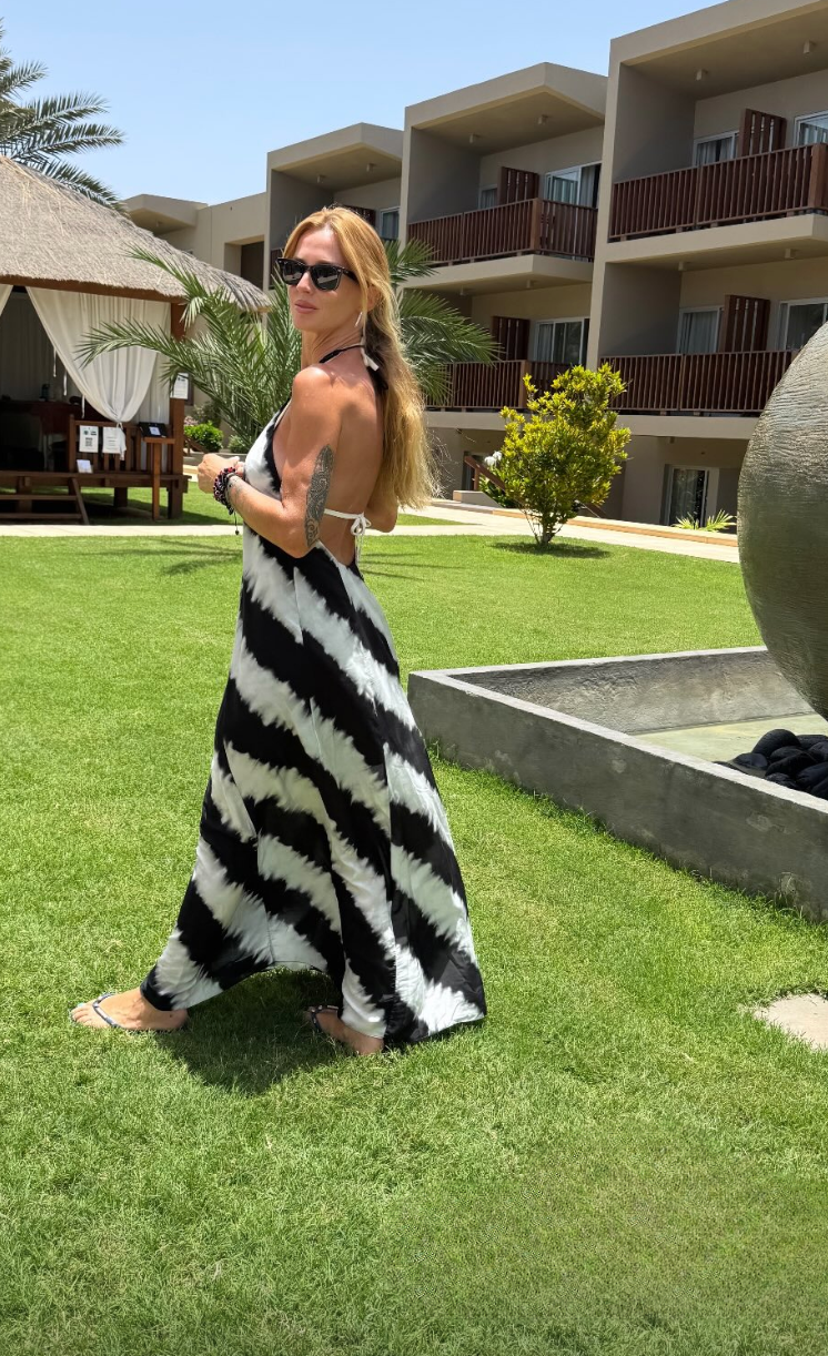 Este vestido de Madalena Abecasis é perfeito para umas férias à beira-mar. Descubra de onde é