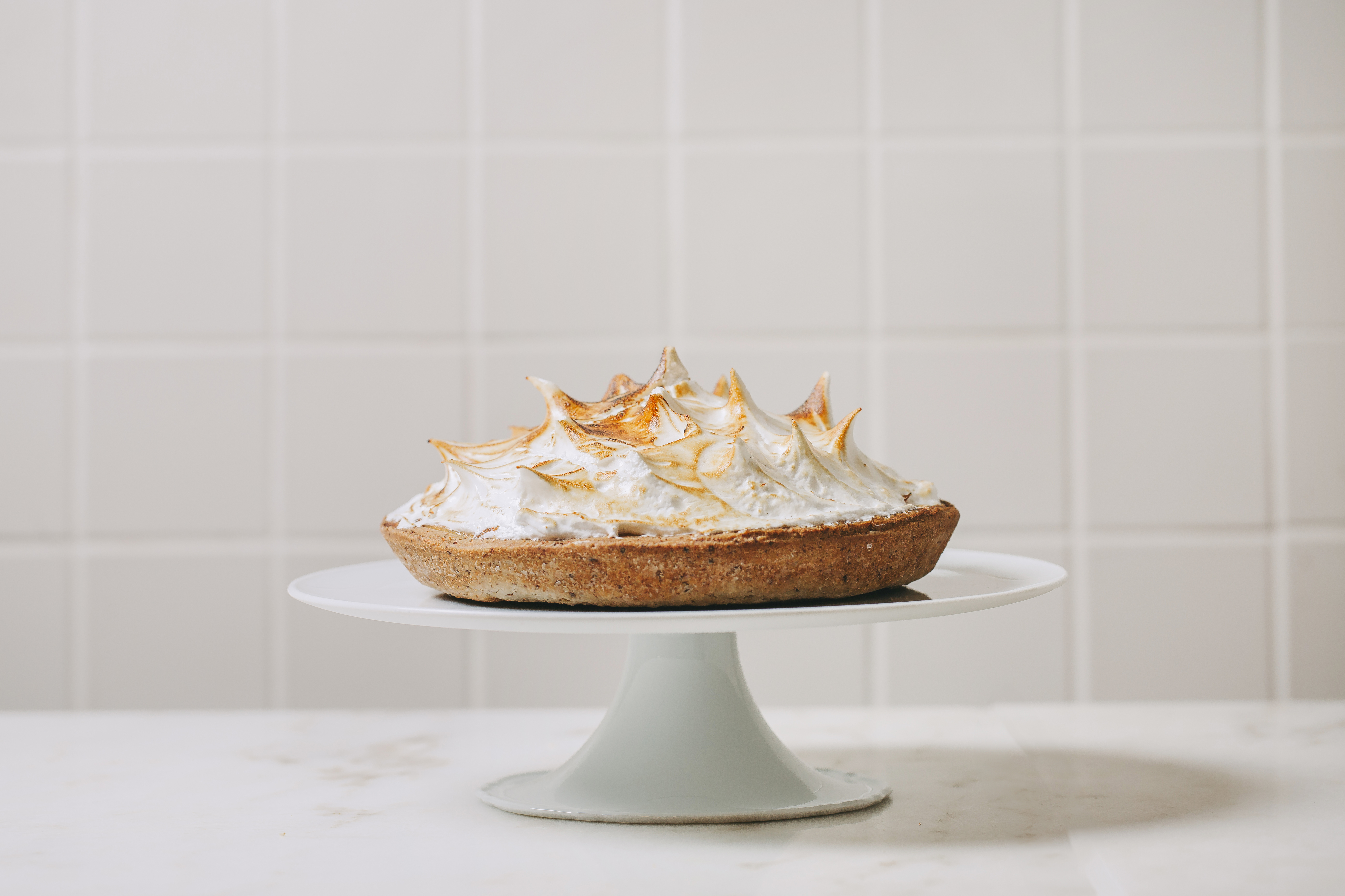 Inteira ou à fatia, a tarte de limão merengada d’A Padaria Portuguesa está de volta – e é mais sustentável do que nunca