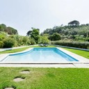 Vivenda com um jardim paradisíaco