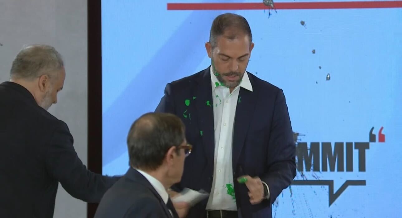 Ministro do Ambiente atingido por tinta verde. Ativistas invadem conferência da CNN
