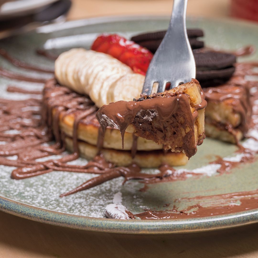 Um restaurante para comer em casa. Camélia Brunch Garden